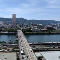 Aerial view of the Burnside Bridge looking west across the river to downtown Portland in August 2019