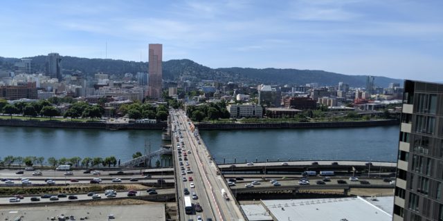 Aerial view of the Burnside Bridge looking west across the river to downtown Portland in August 2019
